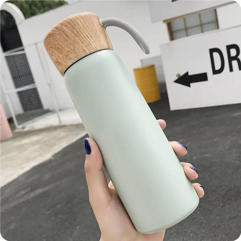 Wood cover bottle